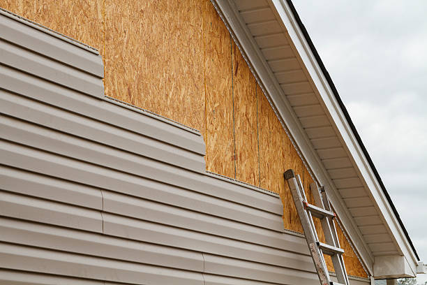 Professional Siding Repair technician working in Midland, OH